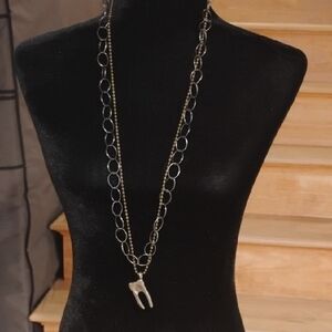 Elegant Silver Necklace with Tooth Pendant